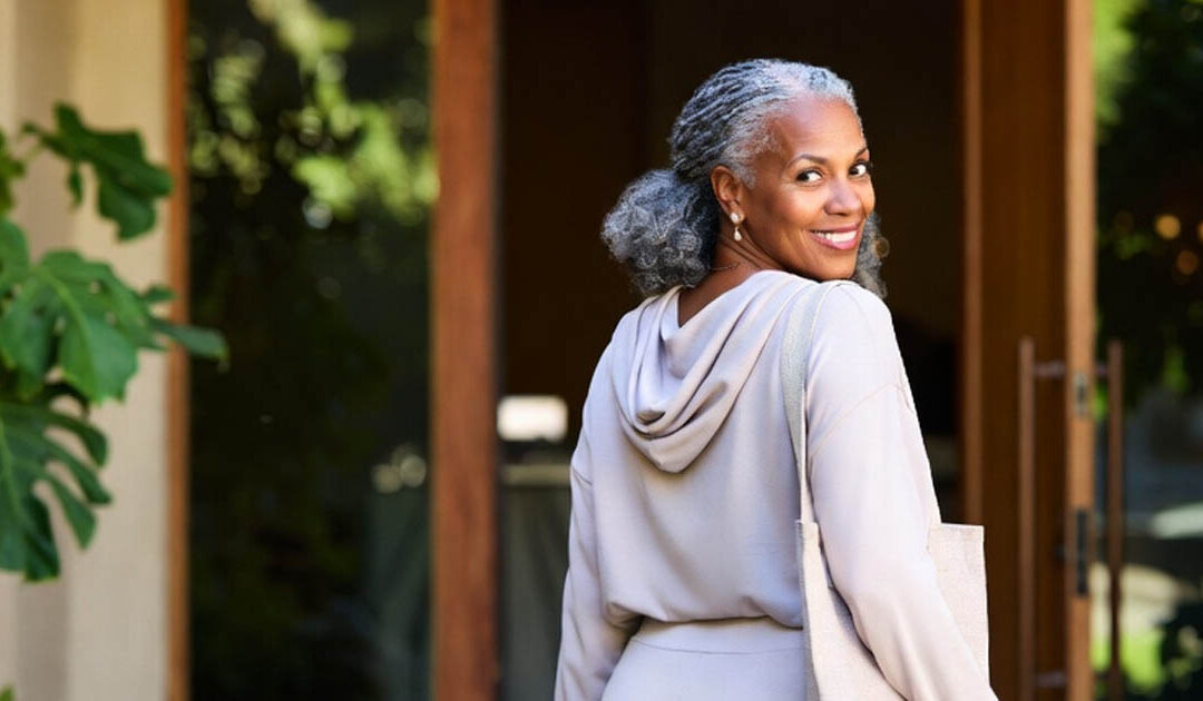 image of a woman looking back leaving a spa