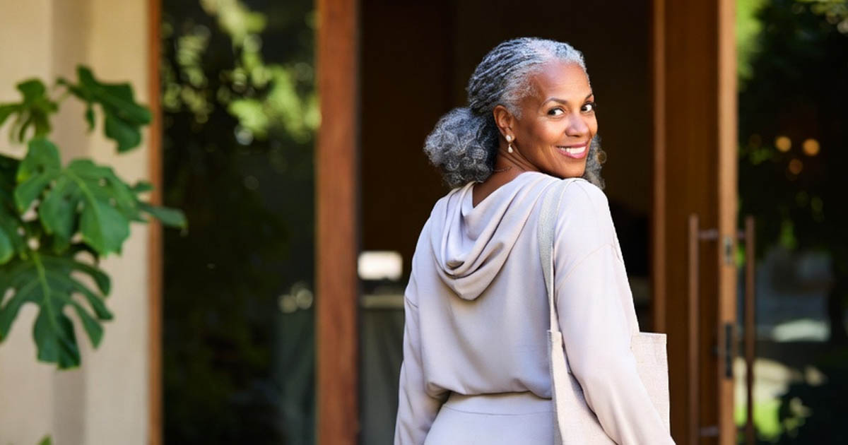 image of a woman looking back leaving a spa